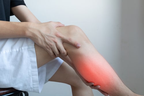 man with calf pain, concept of Sunrise muscle strains treatment