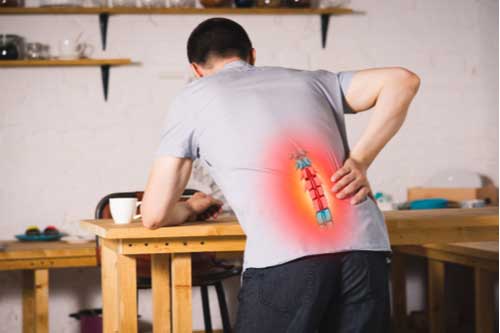 Man with herniated disc back pain